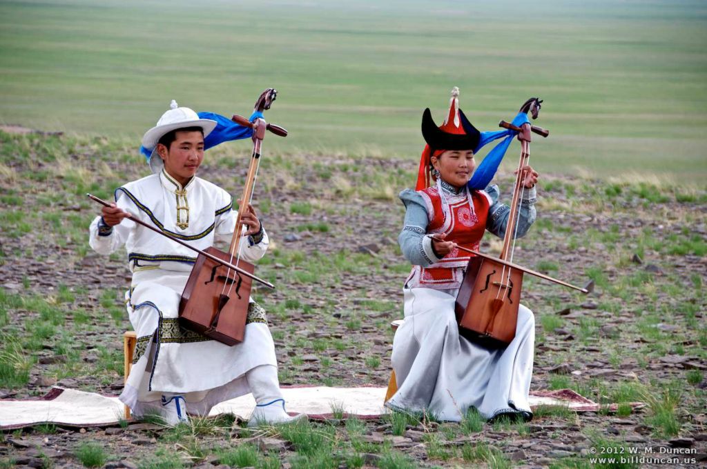 The horse-head fiddle is central to Mongolian music both on the rural steppe and in urban ensembles.
