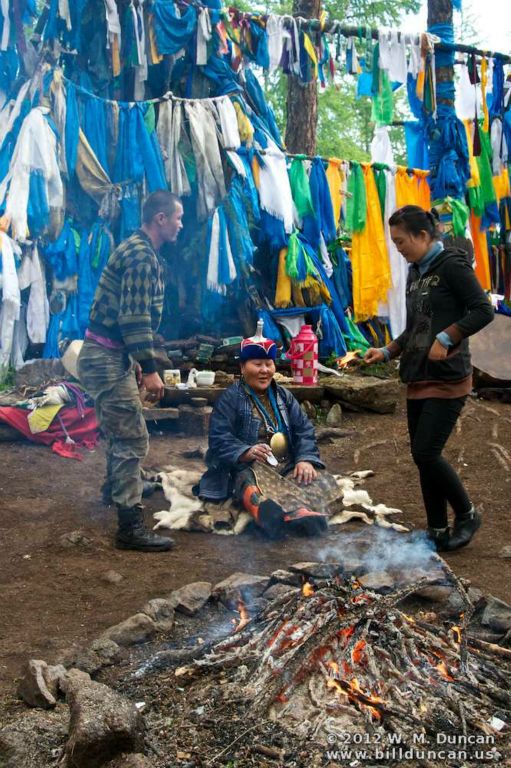 Shamanism is still practiced in Mongolia.  Here a shaman prepares for a trance.