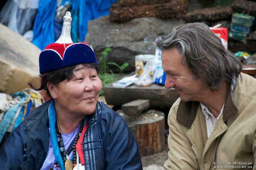 Chris Rainier has a moment with the shaman.