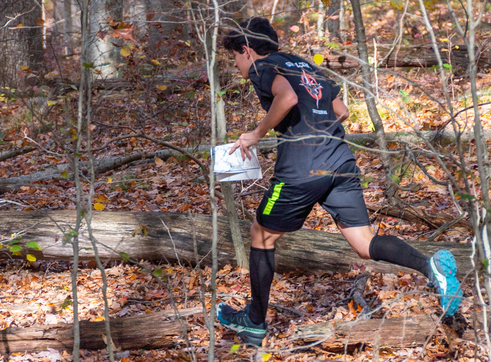 Having "punched" the control he immediately turns to head off to the next one.